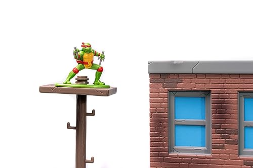 Jada Toys Ninja Turtles Nano Scene Turtle Lair (30 x 25 cm) - Telón de Fondo para coleccionar Figuras de Juguete (Incluye 4 Tortugas Ninja Mutantes Adolescentes de Metal y Accesorios de Juego, a