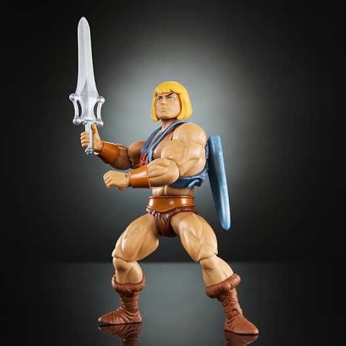 ​Juguete Masters of The Universe Origins, figura de acción He-Man de la colección de dibujos animados, héroe a escala de 5.5 pulgadas con arnés, 2 espadas y minicómics