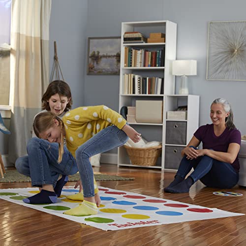 TWISTER Desafía a los niños: el juego de casa desafía a los jugadores a colocar sus manos y pies en diferentes lugares de la alfombra sin caerse