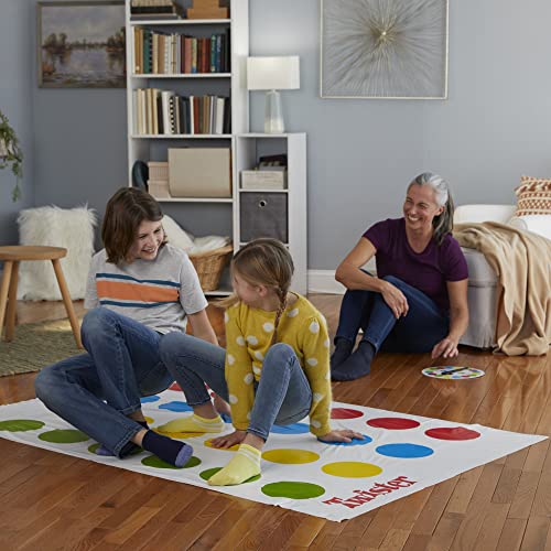 TWISTER Desafía a los niños: el juego de casa desafía a los jugadores a colocar sus manos y pies en diferentes lugares de la alfombra sin caerse